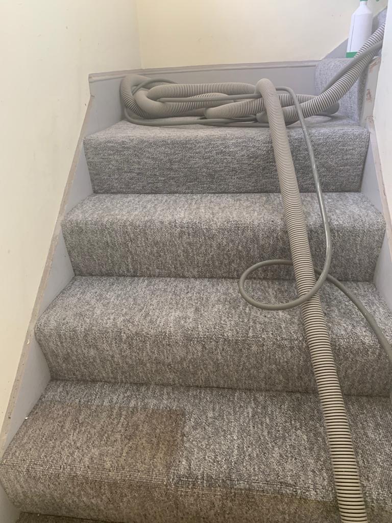 This is a photo of Canterbury Carpet Cleaners Carrying out a carpet clean on a staircase at a house in Canterbury